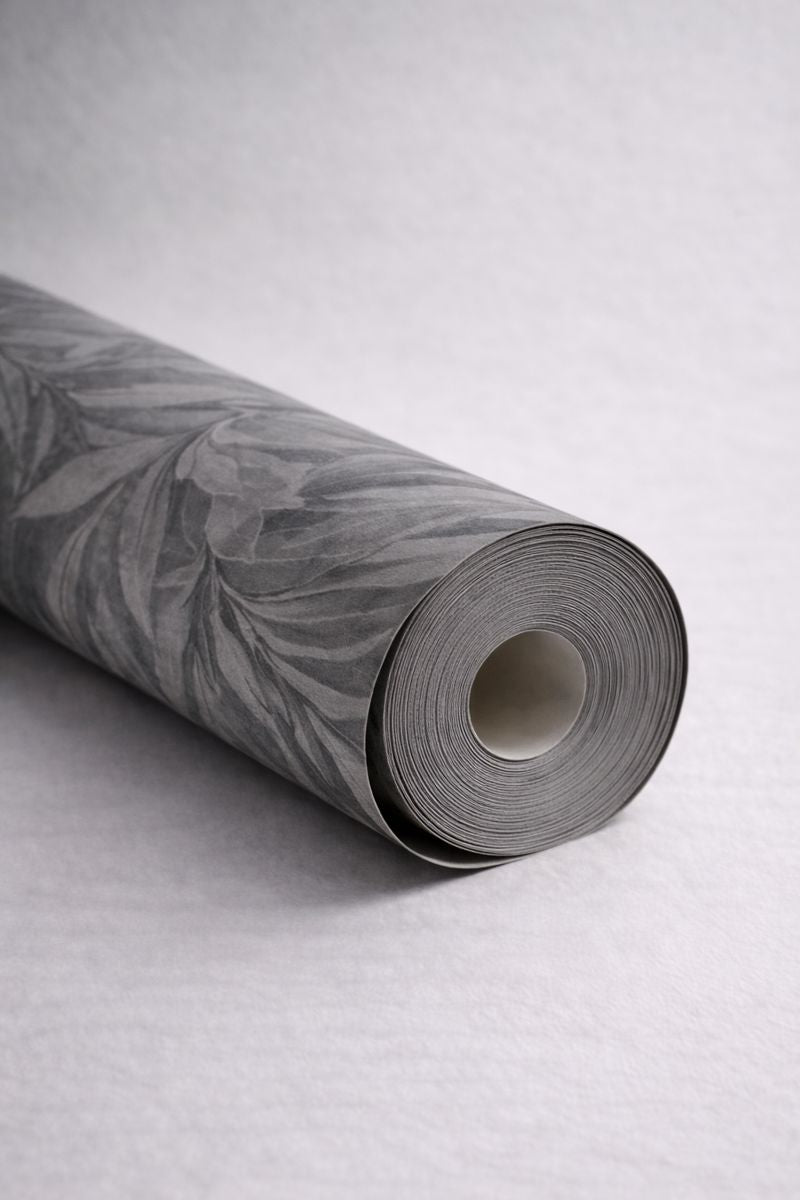 Grey wallpaper roll showing tonal variation and texture