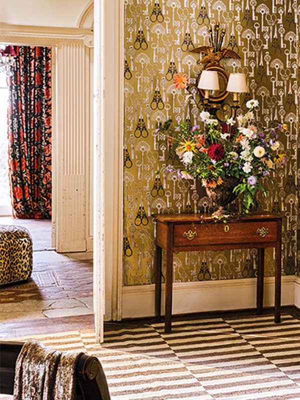 temperley x romo wallpaper collection by romo traditional hallway setting with geometric wallpaper