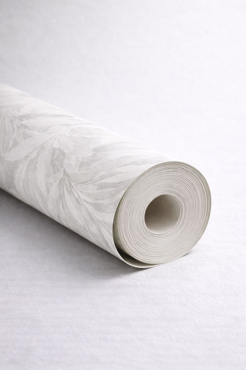White wallpaper roll showing tonal variation and texture