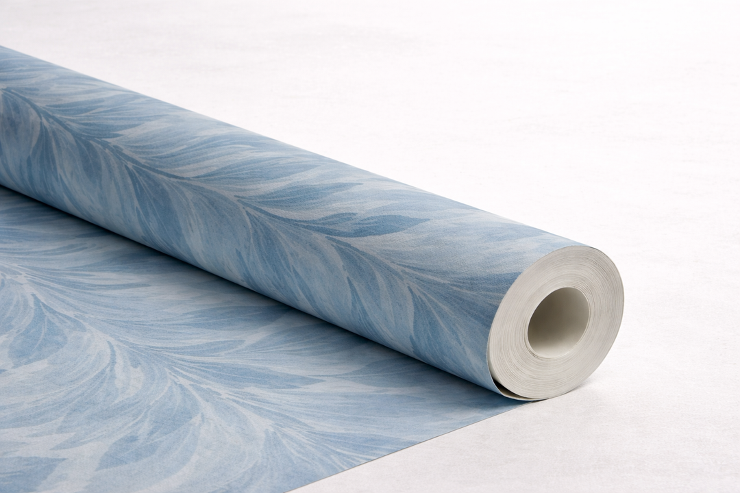 Blue wallpaper roll showing tonal variation and texture

