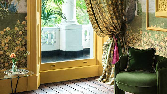 Cole & Son wallpaper in an elegant period living room