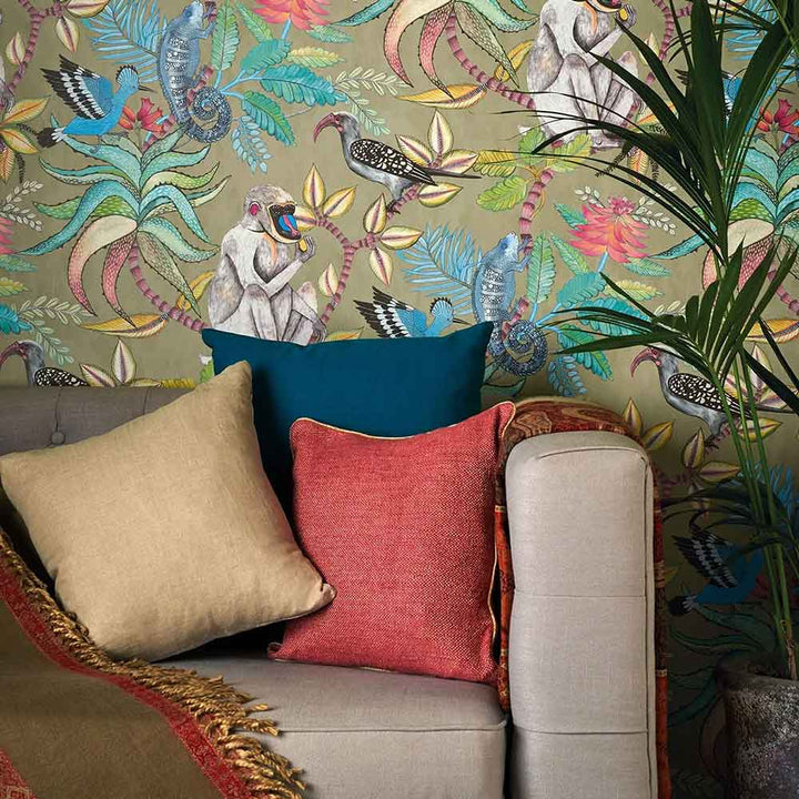 Cole & Son Savuti Wallpaper in old olive featured on the chimney breast of a living room wall
