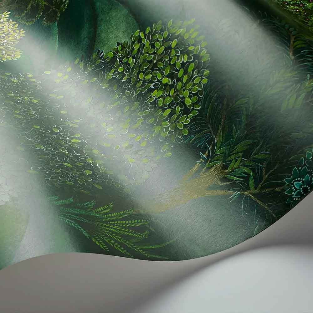 Cole & Son Forest Wallpaper | 115/9028 | displays an unrolled wallpaper highlighting the forest pattern in an exuberant range of greens