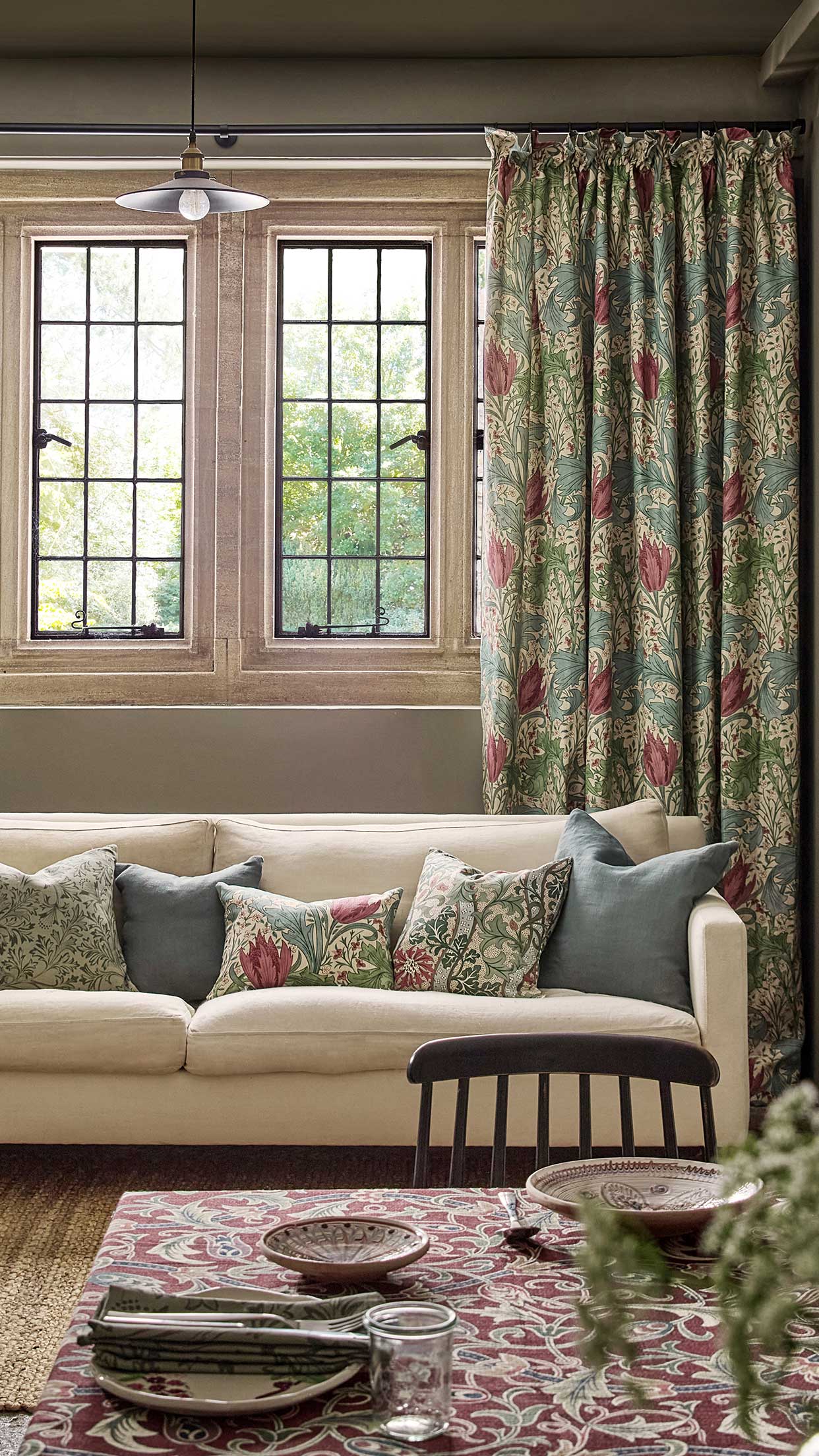 Morris & Co AW25 wallpaper styled in a calm, modern living space
