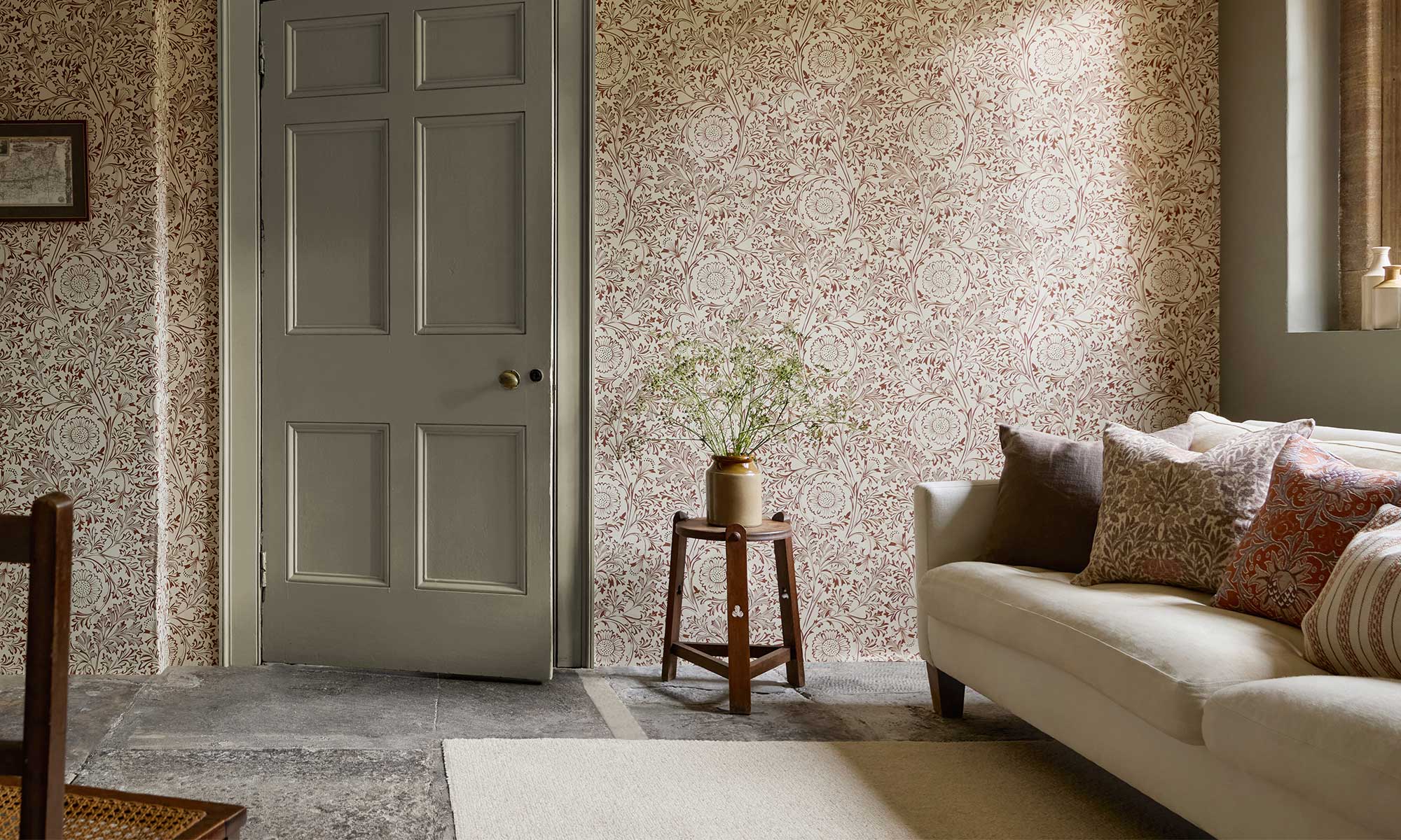 Morris & Co AW25 wallpaper styled in a calm, modern living space