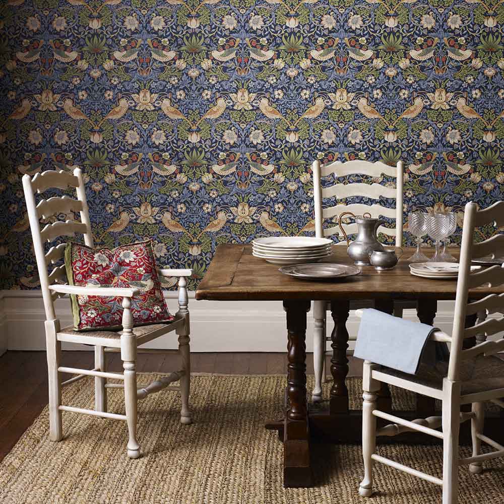 Morris & Co Strawberry Thief Wallpaper | Indigo | Statement feature wallpaper enhancing the dining room
