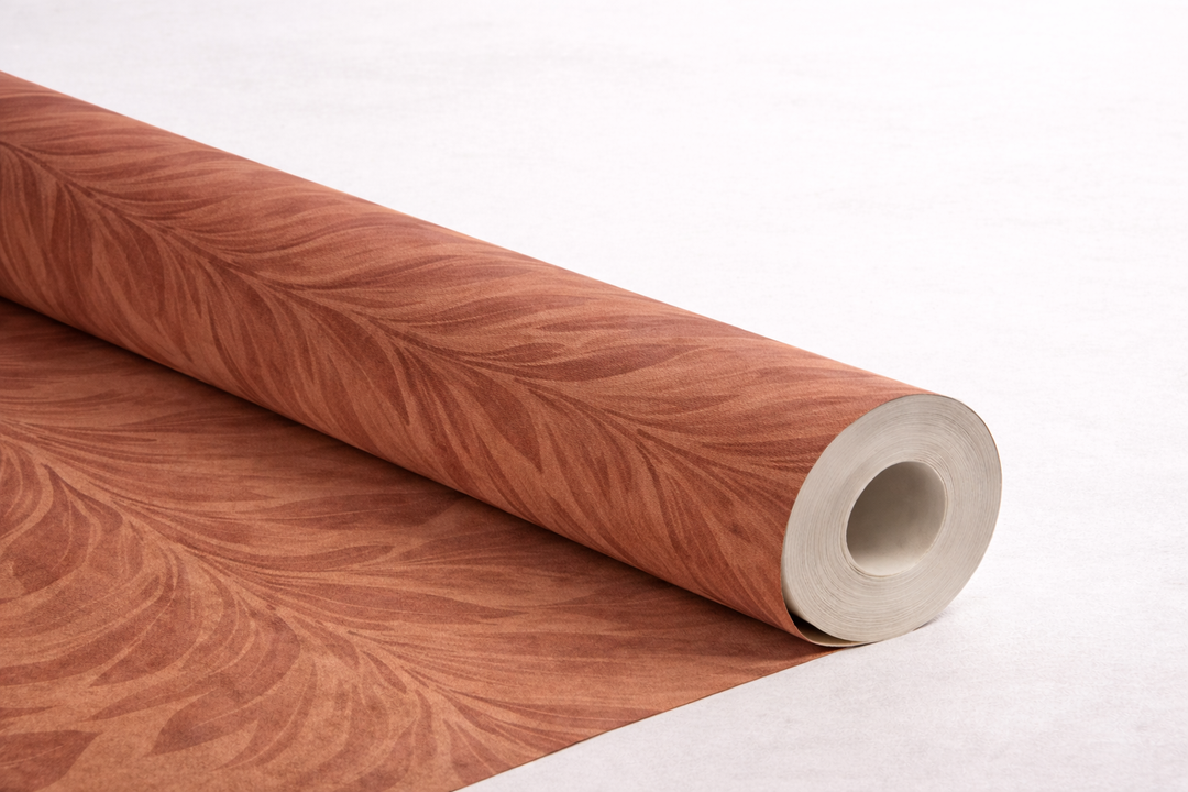 Red wallpaper roll showing tonal variation and texture